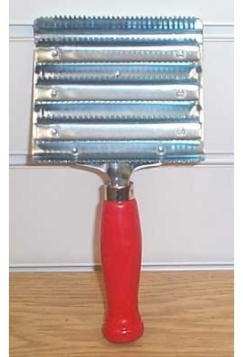 large metal curry comb.jpg