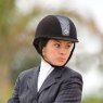 rider wearing polo helmet